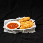 CheeseStix_black_tablecloth